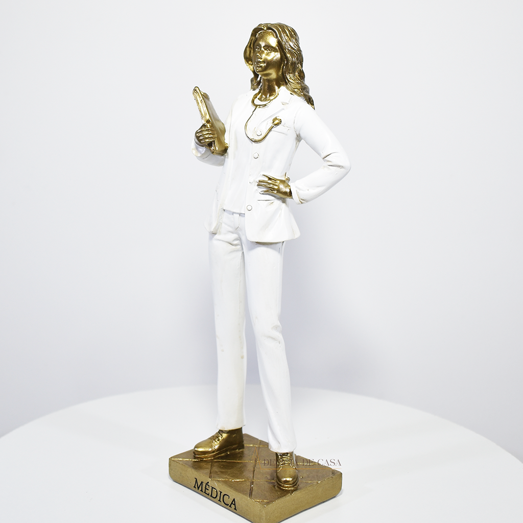 Estátua decorativa de médica em resina dourada e branca, ideal para presente e decoração de clínica médica ou consultório.