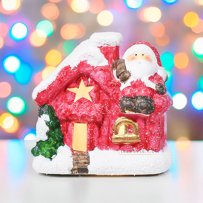 Casinha decorativa de Natal com Papai Noel e neve, feita em resina com glitter e luz interna, 12 cm de altura, nas cores bege, vermelho e cinza.