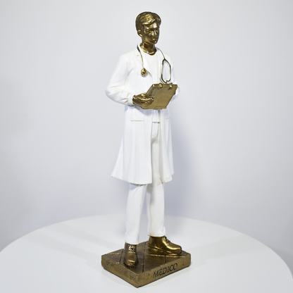 Estátua decorativa de médico em resina dourada e branca, ideal para presente e decoração de clínica médica ou consultório.