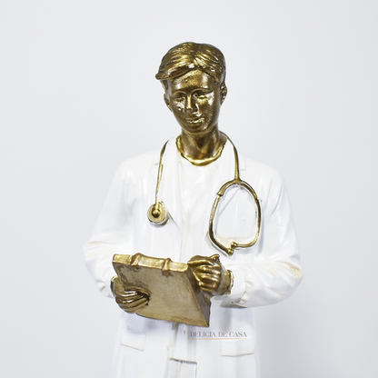 Estátua decorativa de médico em resina dourada e branca, ideal para presente e decoração de clínica médica ou consultório.