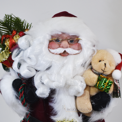 Papai Noel decorativo de pelúcia 40 cm segurando urso e presentes